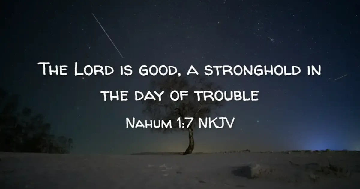 An image of a tree in the desert with the words 'The Lord is good, a stronghold in the day of trouble'